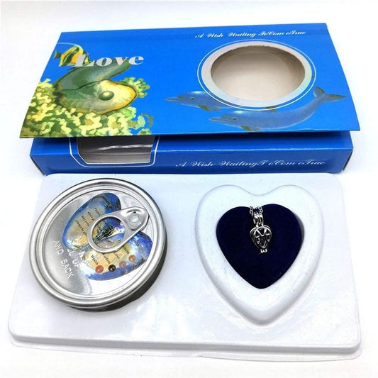 Decorative box with a heart-shaped pendant and a round object on a white background